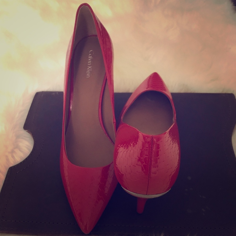 Sexy red 3 inch CK Heels.  Never been worn.
